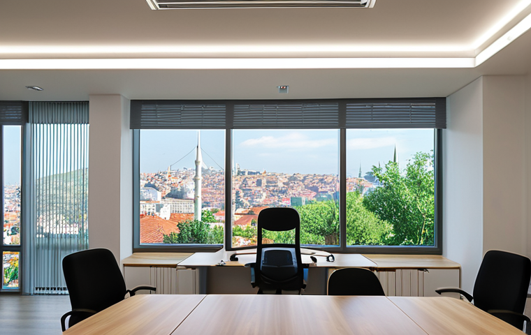 Modern Office with Smart Lighting**
Prompt: "A bright, modern office interior in Istanbul. Sunlight streams through large windows. AI-controlled LED lights automatically dim near the windows, showcasing energy efficiency. Occupancy sensors detect only a few people in the meeting room, and the lights are adjusted accordingly. Sleek, minimalist design with Turkish artwork on the walls. Focus on energy saving and technology."
**